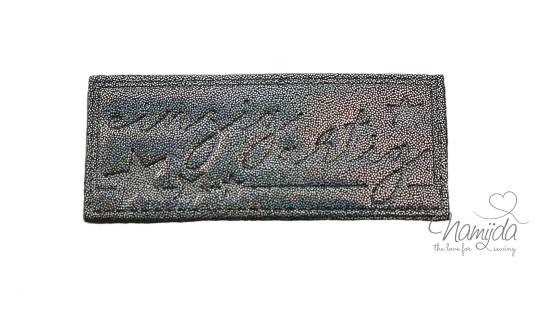 1 Stück - REFLEKTIERENDES LABEL - EINZIGARTIG GLITTER GRAU - AUFNÄHER MIT VORGEDRUCKTER NÄHNAHT - 60mm x 25mm