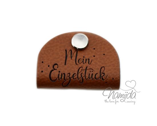 1 Stück - KNiCK MiCH KuNSTLEDER LABEL - Mein Einzelstück + KuPFER VERNICKELTE SCHRAUBE