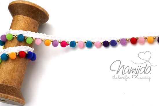 1 MTR. INCA WEBBAND MIT PERLEN & BoMMELN CREME
