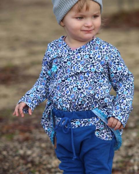 0,5 MTR. FROZEN WINTERBLÜMCHEN TÜRKIS/AUBERGINE FRENCH TERRY